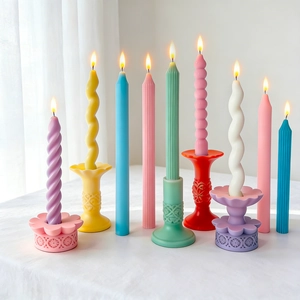 Detailed view of colorful spiral, wavy and beaded striped scented candle silicone molds