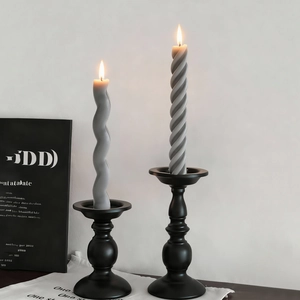 Minimalist black matte candle holder set with spiral and wavy grey aromatic candles