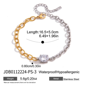 Bracelet chaîne en acier inoxydable bicolore avec zircon central et longueur réglable.