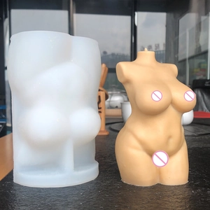 Detail view of female torso silicone mold and the resulting wax art candle finished product