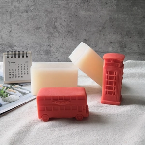 Silicone bus and phone booth candle molds with finished red resin and soap crafts