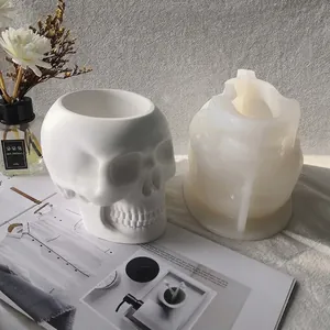 Skull shaped silicone mold for resin and concrete planter with finished white flower pot