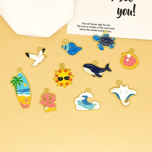 Detailed macro view of colorful ocean-themed alloy enamel charms for DIY jewelry making