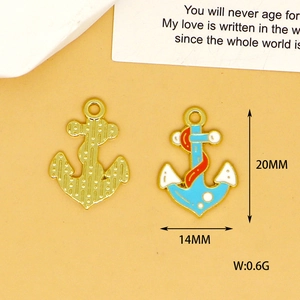 Close-up of anchor charms for DIY jewelry making with dimension markers
