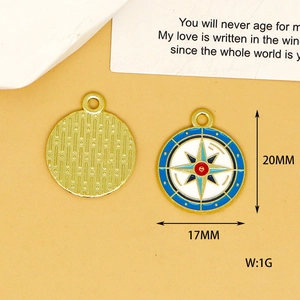 Detailed view of nautical enamel compass pendants with 17mm and 20mm dimensions shown