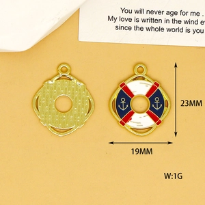Detail of gold-plated enamel lifebuoy charms with nautical anchor motif and measurements.
