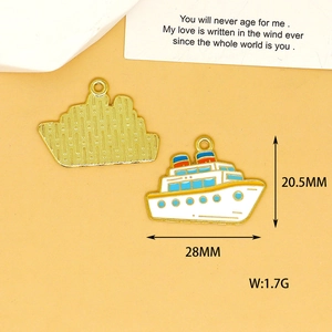 Detailed macro view of cruise ship enamel charm showing 28mm x 20.5mm dimensions