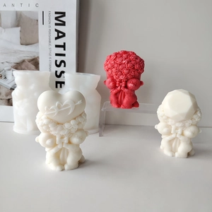 Detailed view of DIY rose bear silicone molds with finished 3D candles and heart textures