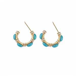 Vintage C-shaped gold plated earrings with turquoise stones and sparkling zircon