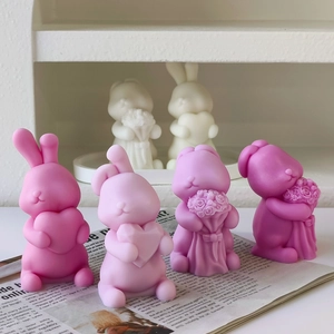 DIY rabbit candle silicone molds in pink and purple colors for Valentine's gift making