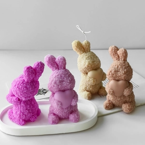 Handmade rose bunny silicone molds for DIY scented candles featuring detailed flower textures