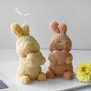 Detailed rose textured rabbit candles with heart motifs for DIY handmade home decor