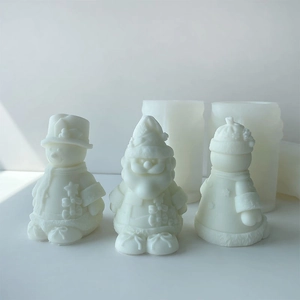 Detail of 3D snowman and Santa silicone molds with textured finish for candle making
