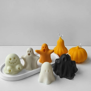 Lot de bougies parfumées fantômes et citrouilles d'Halloween en blanc et orange