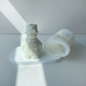 Detail of flexible silicone mold showing intricate 3D Christmas snowman candle design