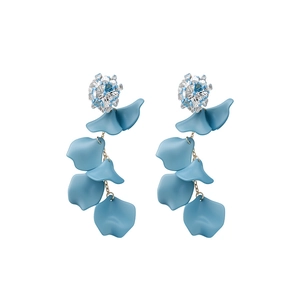 Silver needle earrings featuring glass flowers and light blue acrylic petal tassels