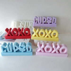 Silicone molds for making XOXO and CUPID scented candles and handmade soaps