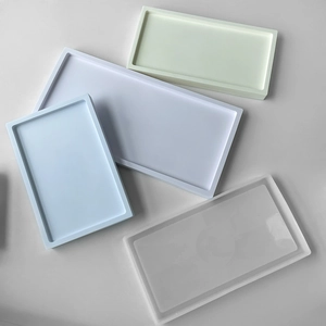 Top view of rectangular silicone tray molds in various colors and sizes for DIY resin art