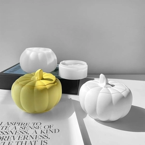Three pumpkin silicone molds showing open and closed storage containers for Halloween DIY