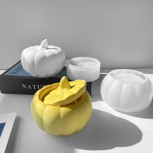 Detailed view of DIY silicone molds for pumpkin storage jars with texture and finished samples
