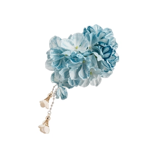 Elegant blue fabric flower hair clip featuring pearl tassels and white bell pendants