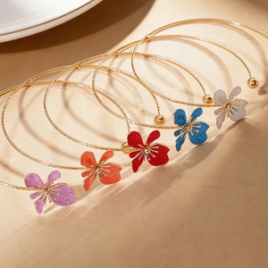 Elegant retro enamel flower chokers in multiple colors with gold-toned metal finish