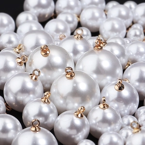 Polished white faux pearl charms with gold metal loops for DIY jewelry making