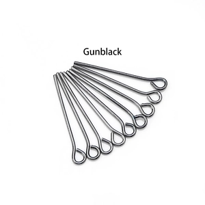 Detail view of eight gunblack eye pins for DIY jewelry making on white background