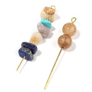 DIY jewelry pendants with natural stone chips and brown cracked beads on gold eye pins