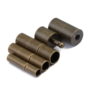 Detailed macro view of bronze plug-in metal clasps for DIY jewelry and leather cords