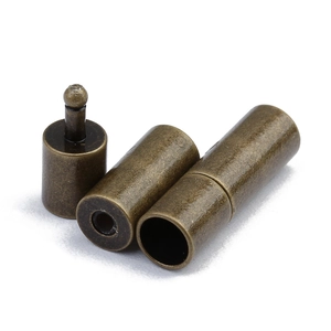 Detail view of antique bronze cylindrical plug-in clasps for DIY jewelry making