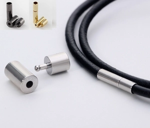 Close-up of metallic cord end caps and clasp connectors for jewelry making in various finishes