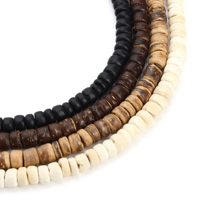 Macro detail of natural wooden abacus beads in four colors for DIY jewelry making