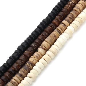 Macro detail of natural wooden rondelle spacer beads in four assorted organic earth tones