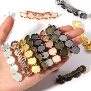 DIY metal spring hair clips with five round bezel settings in various metallic finishes