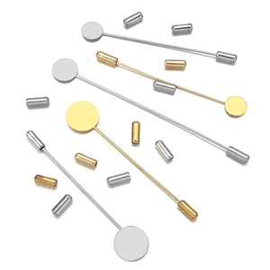Detailed view of gold and silver plated long stick lapel pins with flat round pads