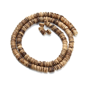 Detailed view of dark brown flat disc wooden beads with natural grain for DIY jewelry
