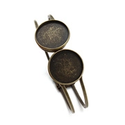 Detail of vintage brass DIY bracelet with double round cabochon base for jewelry making