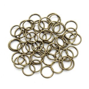 Detail view of bulk vintage bronze jump rings for DIY jewelry making and metal crafts