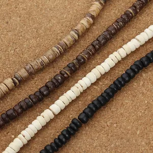 Close-up of natural wood heishi beads in four colors for DIY jewelry making and crafts