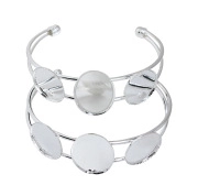 Detailed view of DIY silver-tone open bangles with three blank round bezel settings