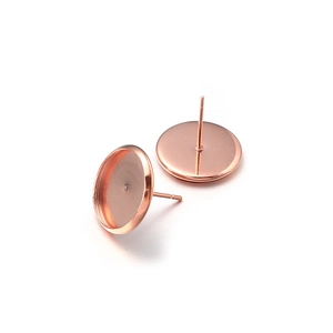 Macro view of rose gold round bezel cup earring studs for DIY jewelry findings