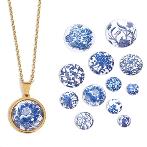 Detailed set of blue and white porcelain glass cabochons and gold necklace accessories
