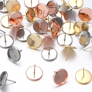 Flat round stainless steel stud earring bases in gold, silver, and rose gold finishes