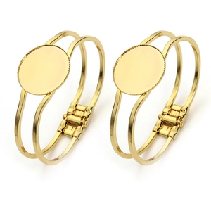 Close-up of golden vintage bangle base with a 25mm round bezel for DIY jewelry