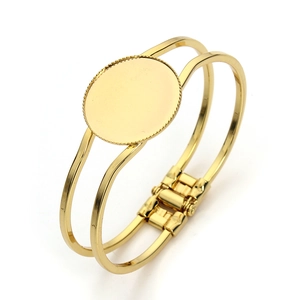 Detail of a 25mm gold-toned vintage blank bracelet with oval bezel for DIY jewelry making
