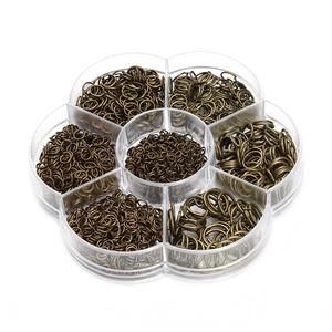 Antique bronze open jump rings set for DIY jewelry in a flower plastic organizer box