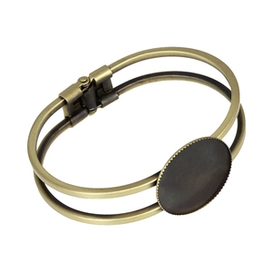 Detailed view of bronze open cuff bracelet with a 25mm round tray for DIY jewelry making