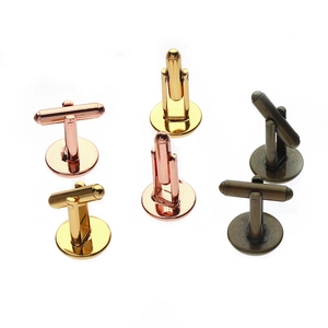Detailed view of rose gold, gold, and bronze cufflinks bases with swivel T-bar backs
