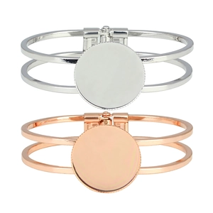 Vintage style double-wire hollow bangle with 25mm round bezel setting in silver and rose gold